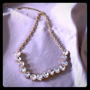 Gold tone with clear gems 8”.